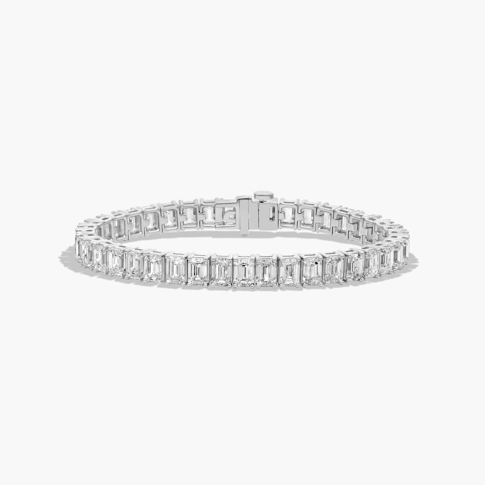 White gold version of the Always Evolving tennis bracelet, showcasing emerald cut diamonds and clasp detail.