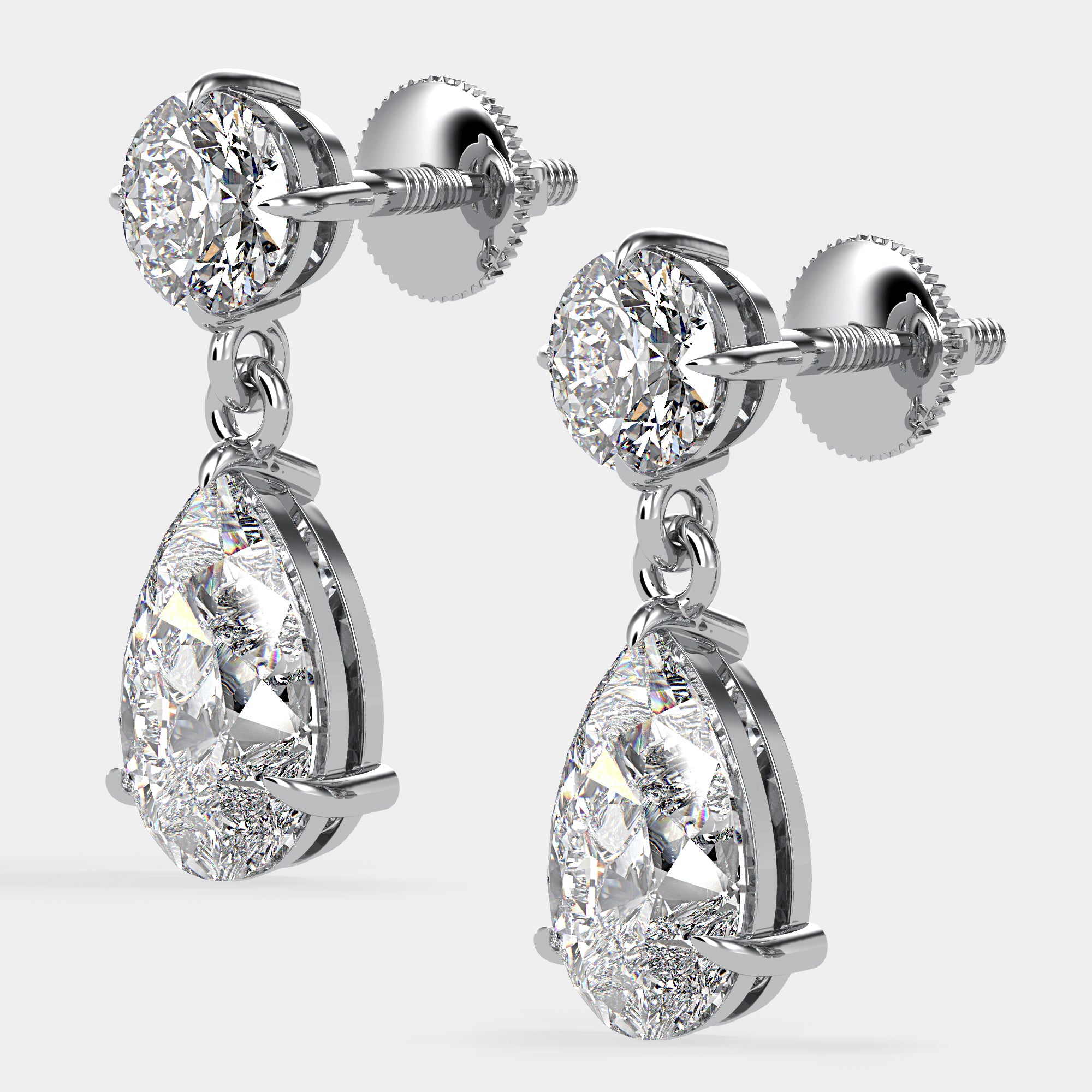 Side angle of white gold Bougie Baby Duo Earrings showing the elegant drop design