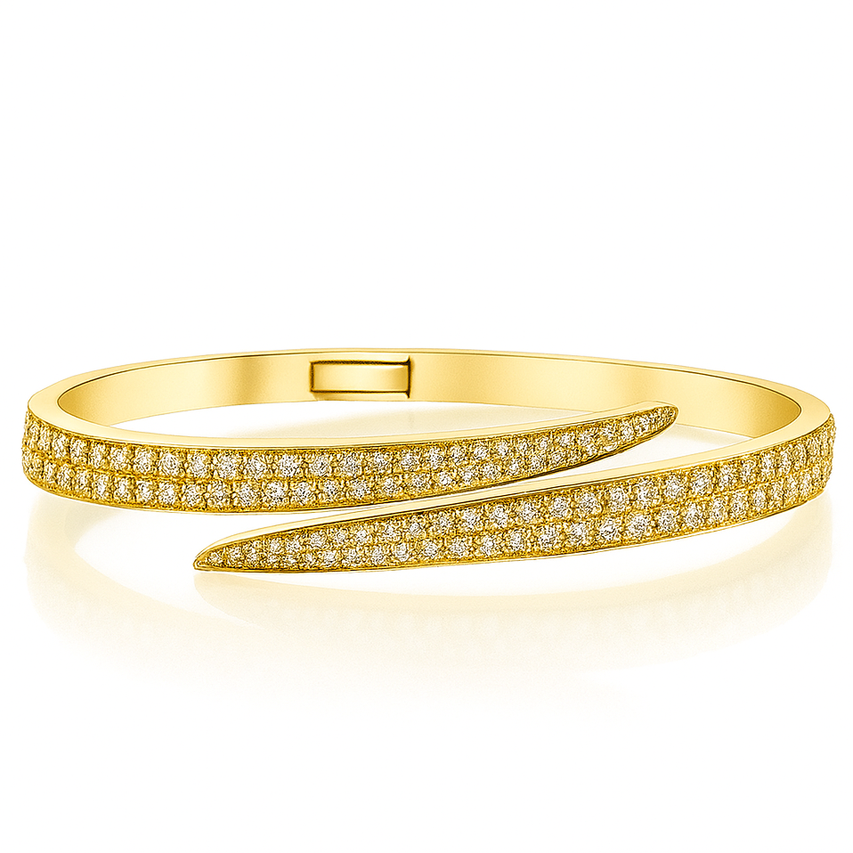 Front-facing product image of Bypass the Rules diamond bangle in yellow gold, highlighting curved bypass shape and sparkle.