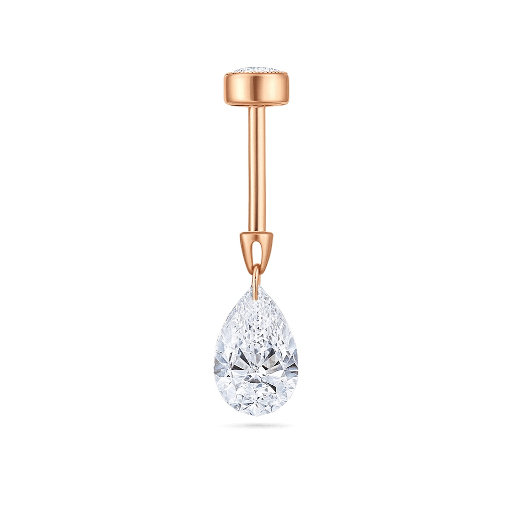 Close-up of Cleo's Lucky Ear Charm in rose gold, floating pear-cut charm for cartilage or conch piercings