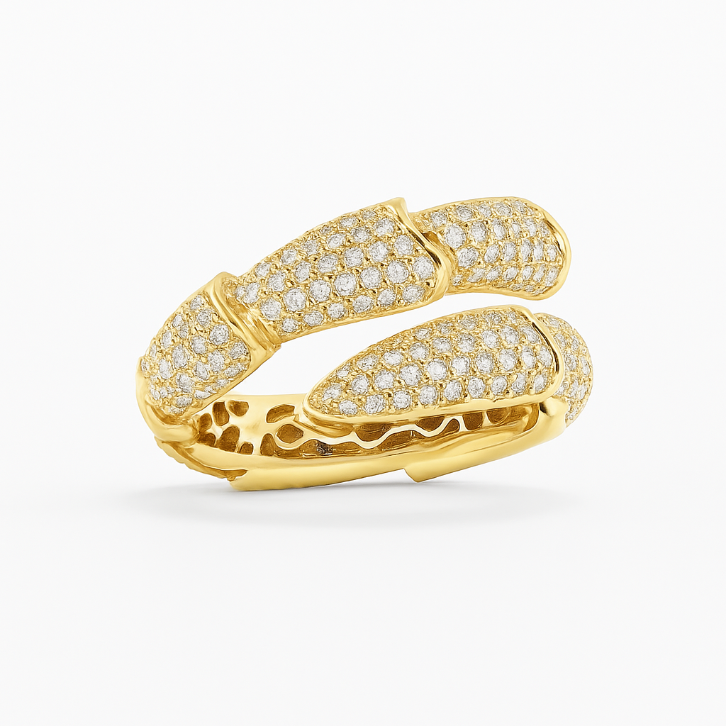 Side detail of Eclipse Coil wrap ring with pavé diamonds in yellow gold