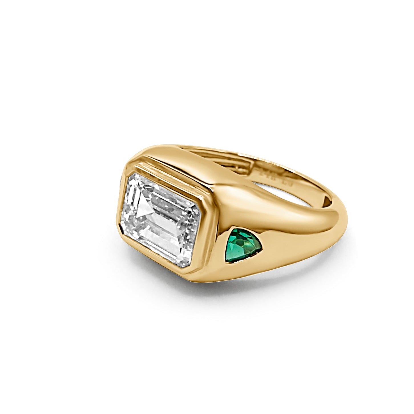femme forte signet ring 3 carat emerald cut diamond with green side stones side view