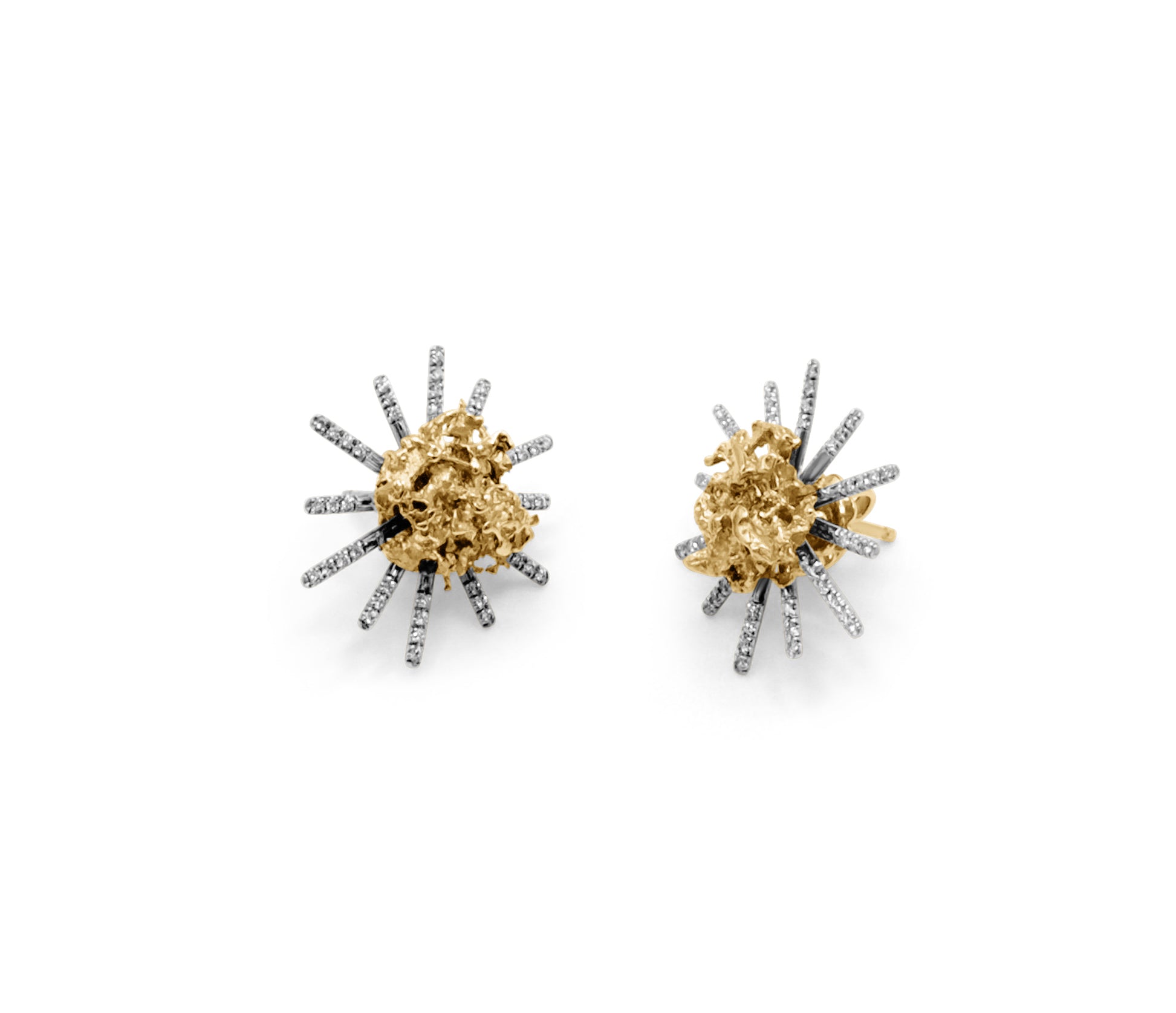 Side detail of raw textured Golden Nugget Earrings in luminous 21k gold