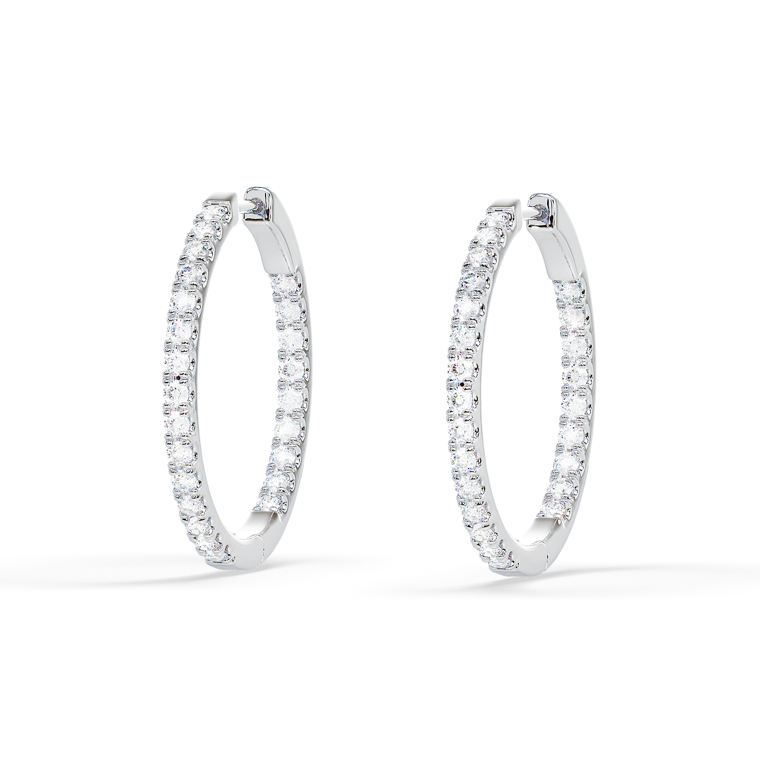Front view of Hug Me Hoops diamond inside-out hoop earrings in white gold