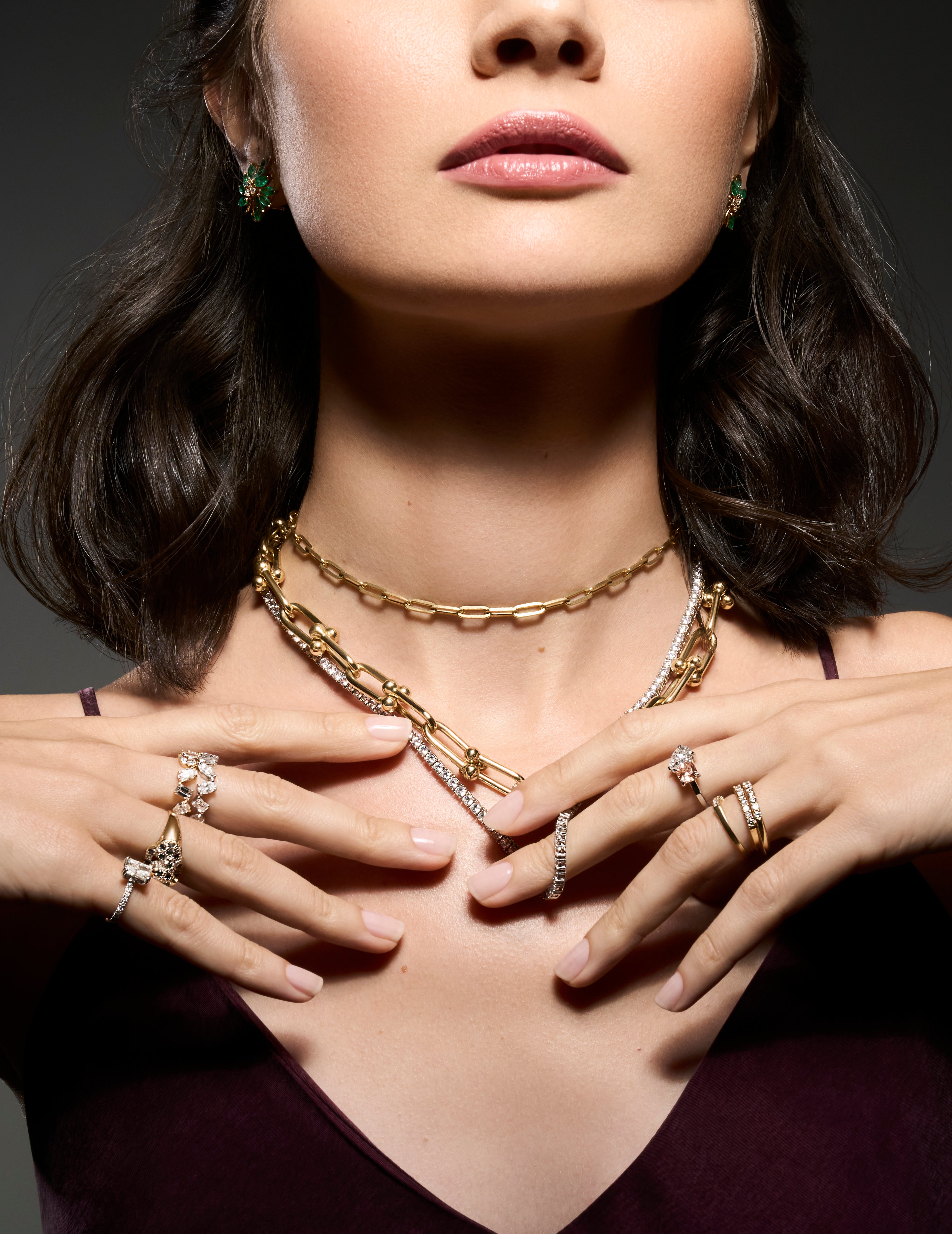 Link Me Chain 18k gold pavé diamond necklace stacked with other necklaces and rings on model, layered fine jewelry styling.