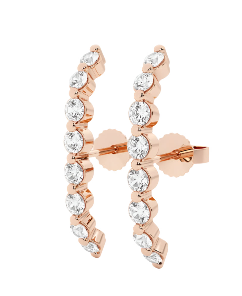 Side view of Luna Light curved stud earrings in rose gold with bezel-set diamonds
