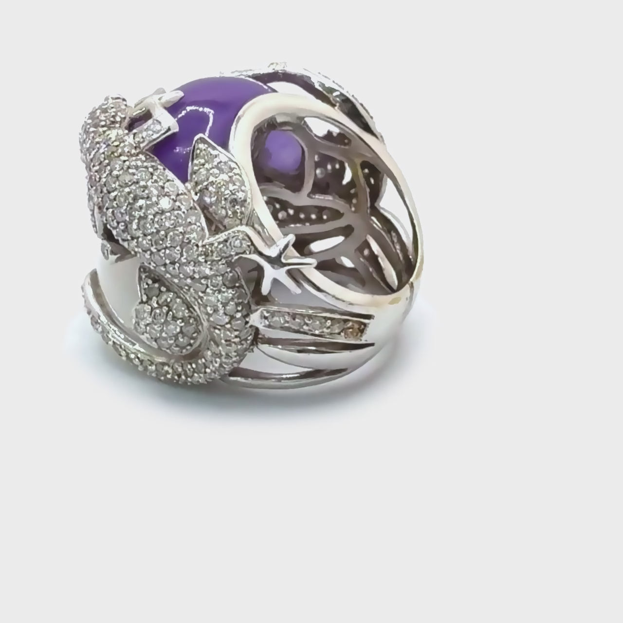 360 video of Lizard Hugs Ring featuring jade and diamond detailing in 18k white gold