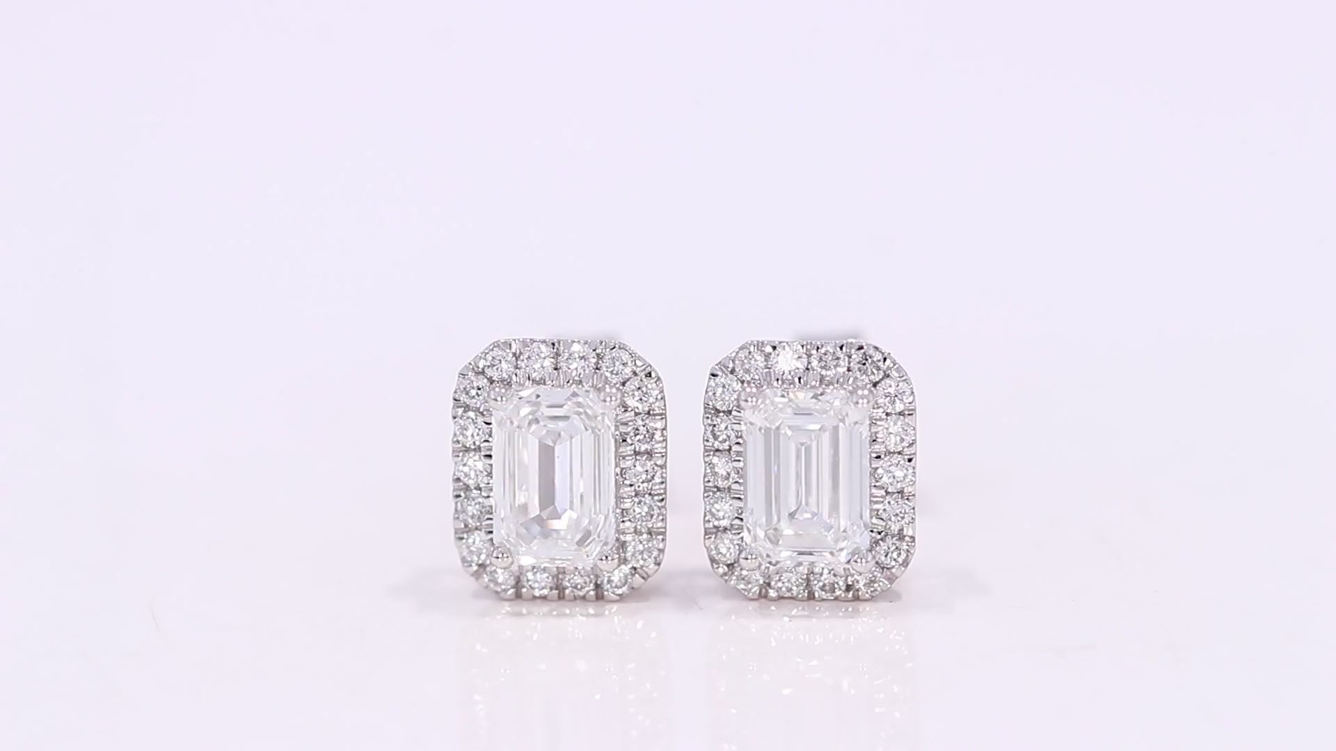 360-degree video of Angel Stud diamond halo earrings in white gold