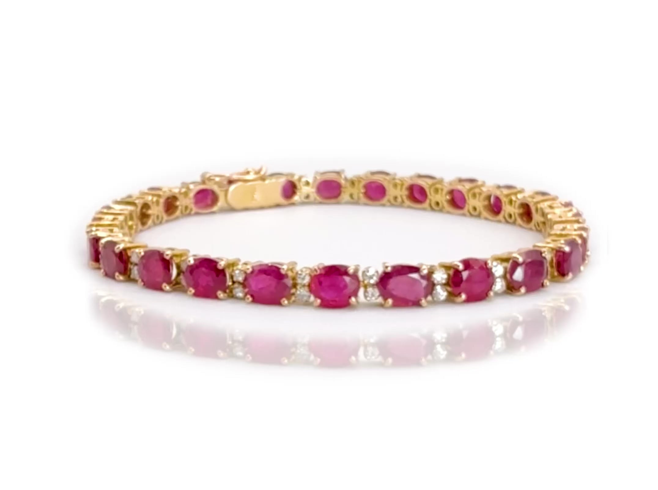 360-degree video of the Heaven Sent tennis bracelet in 14k gold with natural rubies and diamonds, showcasing full view of the design and movement.
