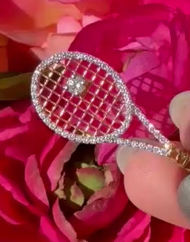 Video close-up of Love All Pendant in rose gold highlighting pavé diamond details and tennis racket silhouette