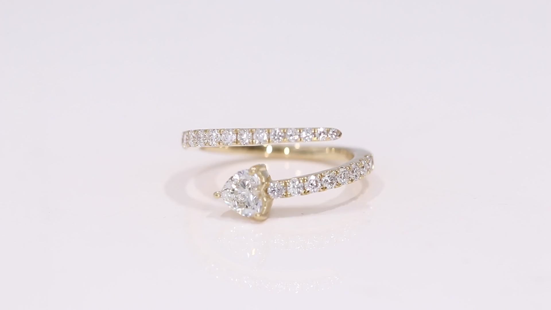 360 video of the Love Bomber Heart Ring showcasing wrap design and heart-cut center diamond