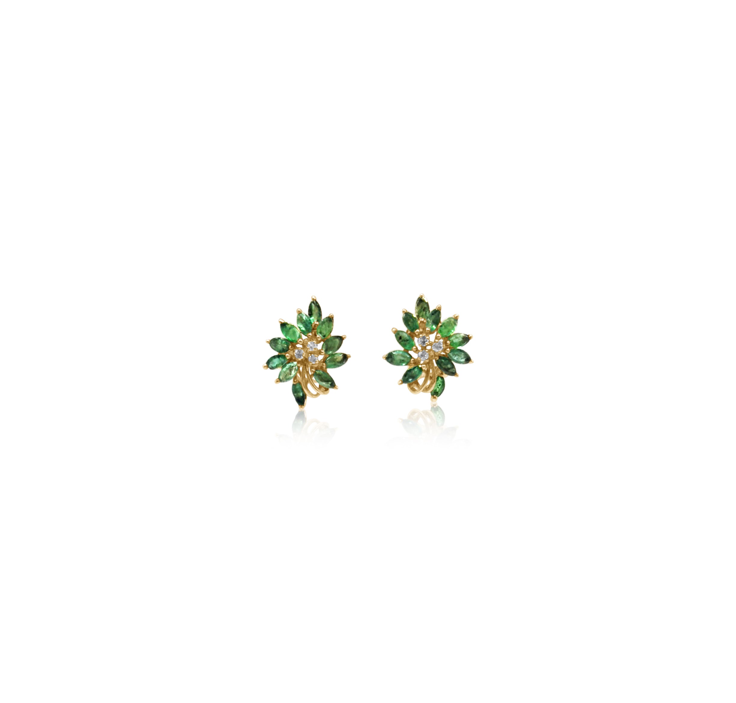 Close-up front view of Tree Hugger emerald and diamond earrings with floral-inspired design