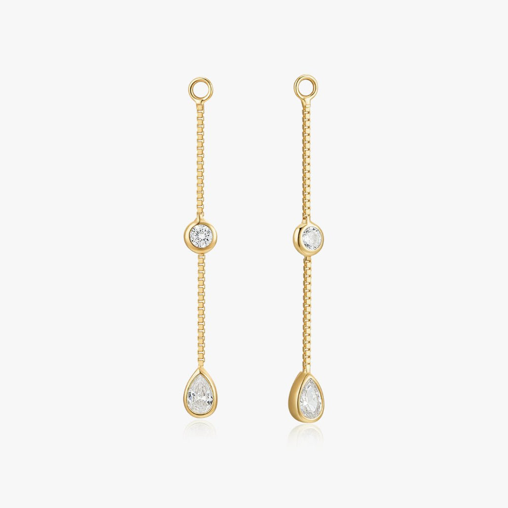 Pair of Truth Seeker Ear Pendulums in 14k yellow gold shown as versatile diamond earring charms