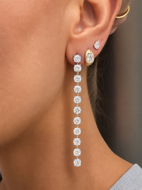 11:11 Diamond Drop Earrings featuring 10.3 carats of linear drop diamond earrings in yellow gold styled on ear — Waltz Diamonds