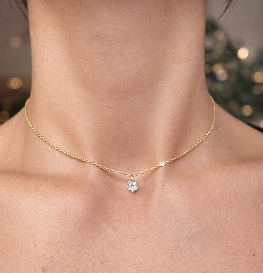 Adora Daphne floating diamond necklace in yellow gold close-up on model —Waltz Diamonds 