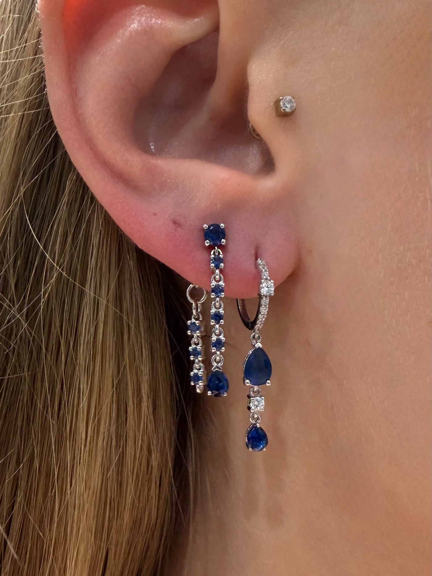 Baby Blue Drop Earrings double row sapphire line drop earrings in white gold styled on ear — Waltz Diamonds