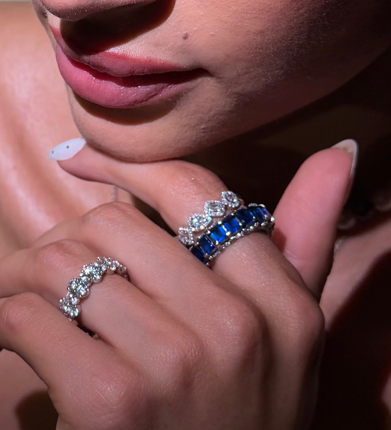 Blue blood sapphire eternity ring styled with other Waltz Jewelry — Waltz Diamonds