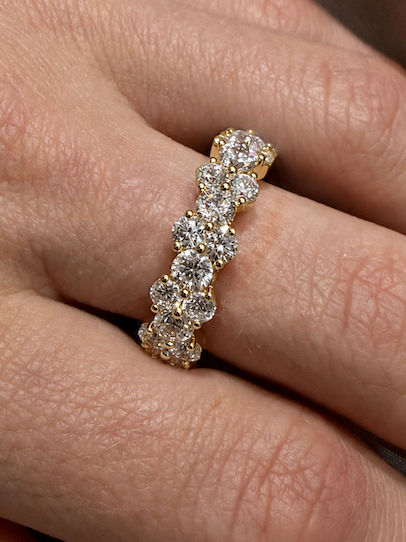 Daisy Diamond Cluster Eternity Band yellow gold on hand — Waltz Diamonds