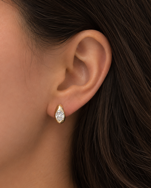 Eclipse Baby Diamond Huggies 1 ctw oval domed huggies yellow gold on ear — Waltz Diamonds