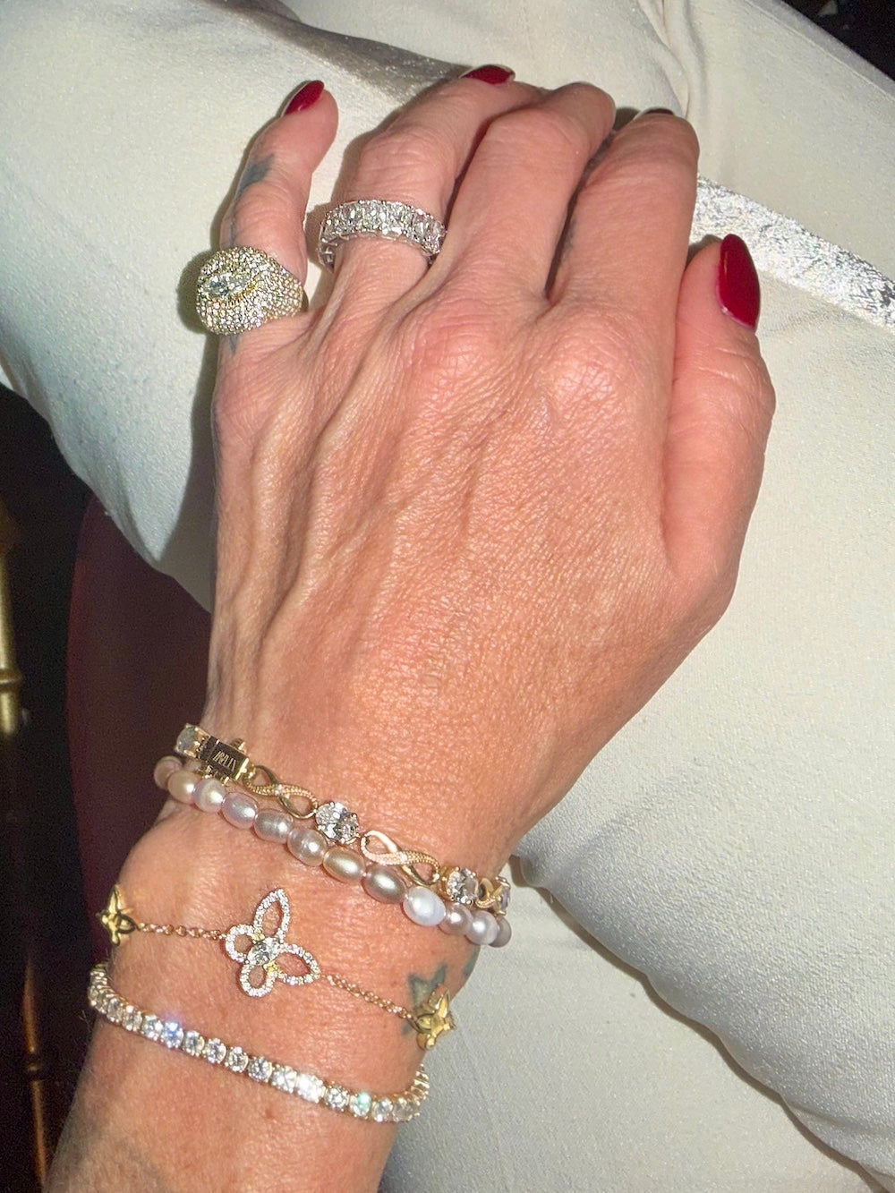 Eternal radiance band styled on hand — Waltz Diamonds