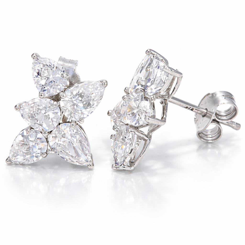 Fifth Element - Pear Cluster Earrings in white gold 5 pear cut diamonds clustered together in each earring — Waltz Diamonds