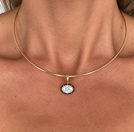 Five Kings georgian pendants in pear oval and marquise cuts stacked and stylesdon a model—Waltz Diamonds