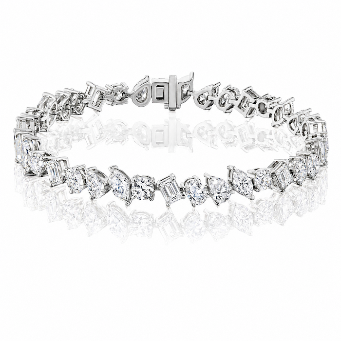 Habibi Multi-shaped tennis bracelet with pear,round,marquise,oval,and emerald cuts in white gold— Waltz Diamonds
