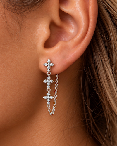 Holy Trinity diamond chain earrings A pair of white gold dangle earrings with three  diamond crosses on ear — Waltz Diamonds