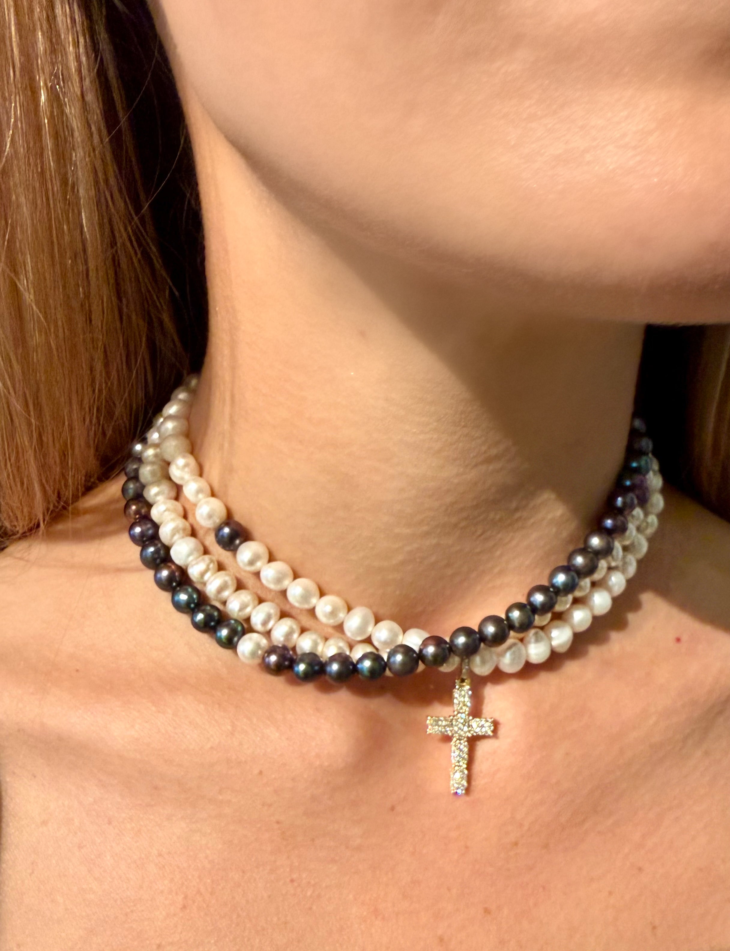 Holy water pearl pendant paired with Fallen Halo Pearl choker in peacock and white on model—Waltz Diamonds