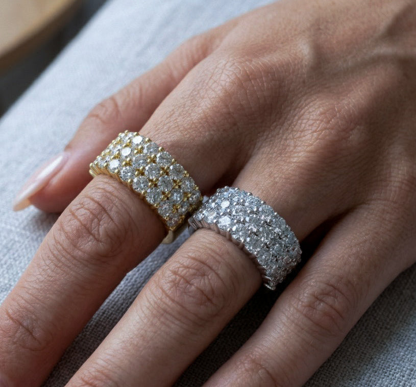 Honeycomb band a three row diamond band in yellow and white gold on models hand —Waltz Diamonds