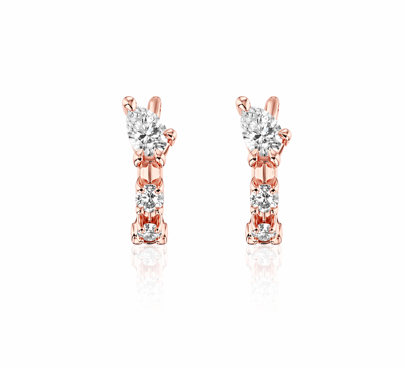 Hybrid Huggies featuring a pear cut top diamond and two round in rose gold — Waltz Diamonds