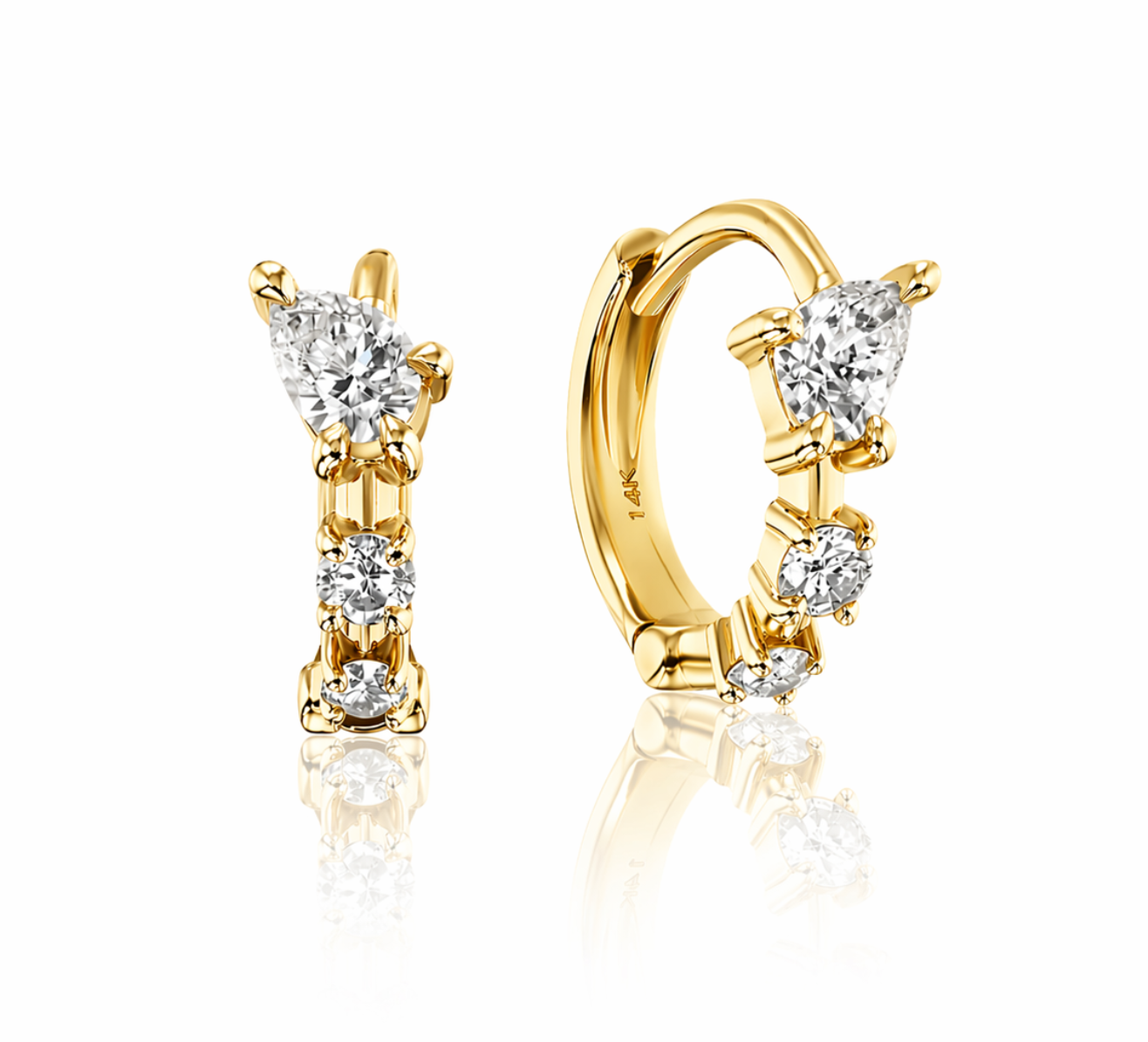 Hybrid Huggies featuring a pear cut top diamond and two round in yellow gold — Waltz Diamonds