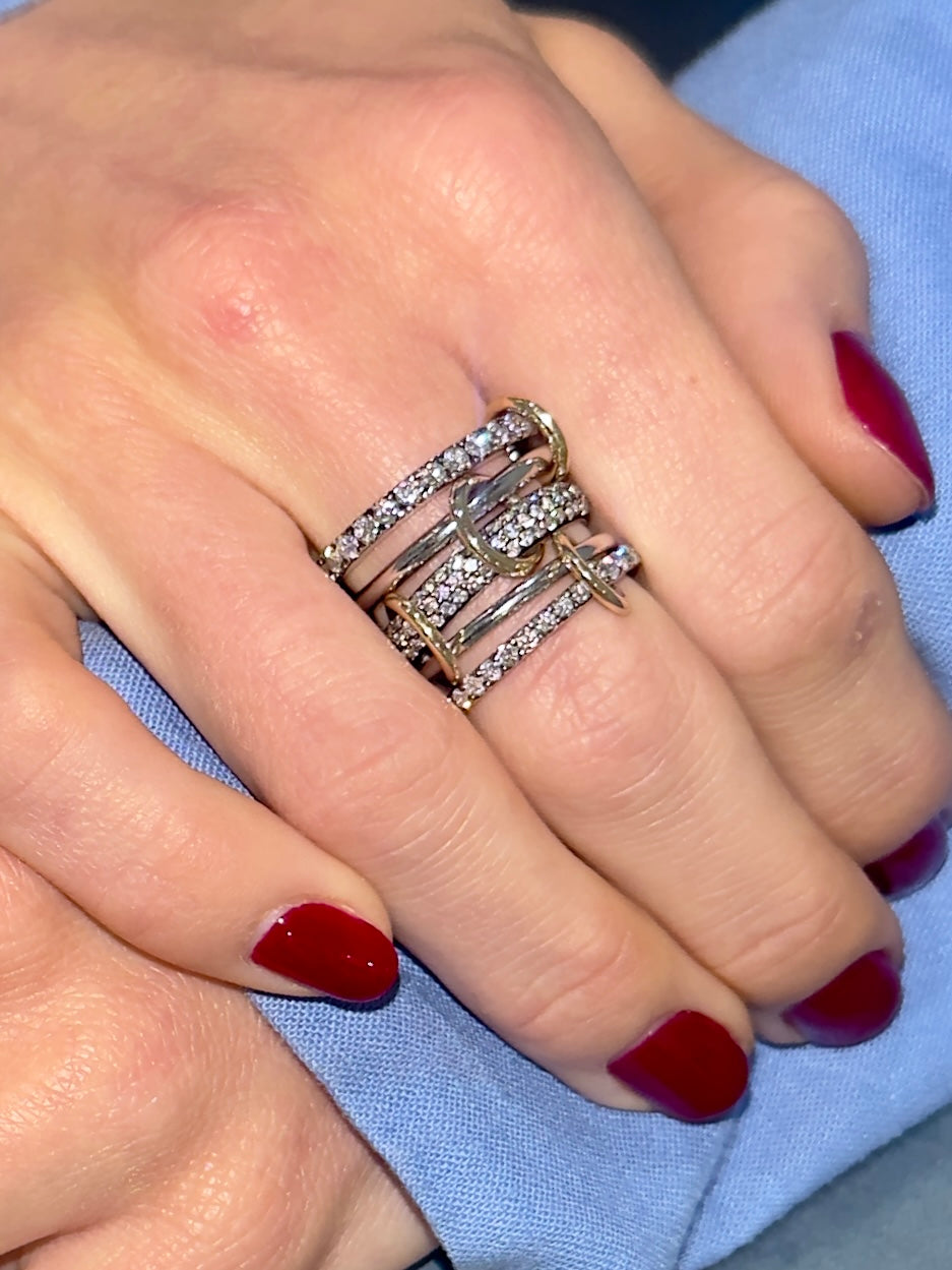 Quintet Ring with mixed metals and diamonds five bands connected by small rings on model  — Waltz Diamonds