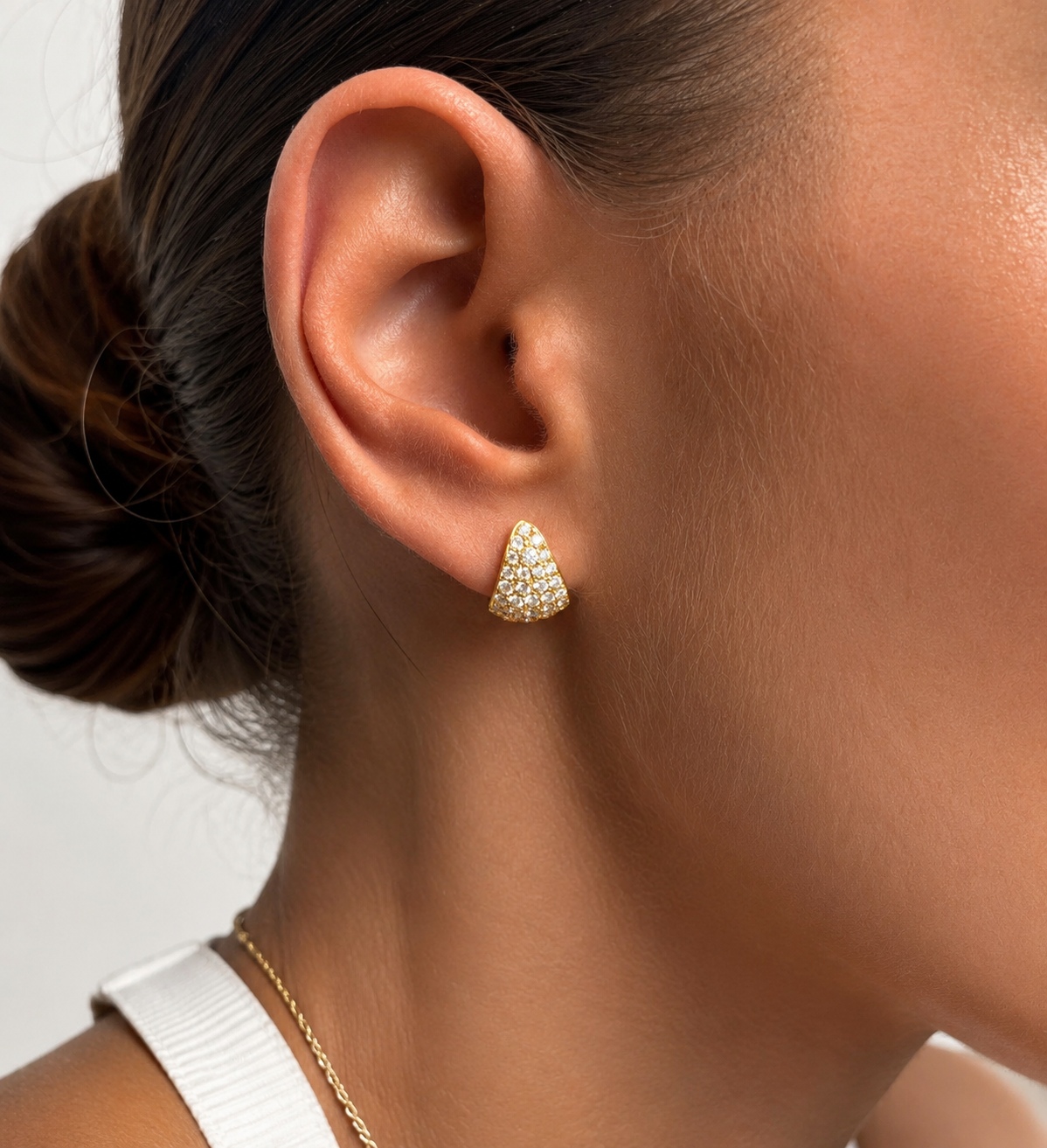 Lobe lock huggies in yellow gold pave triangle shape earrings on model — Waltz Diamonds