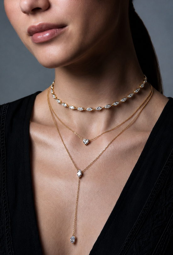 Oria Marquise Choker with 14 bezel-set marquise cut diamonds rose gold styled on model also wearing Fine Line Lariat and the chosen heart— Waltz Diamonds