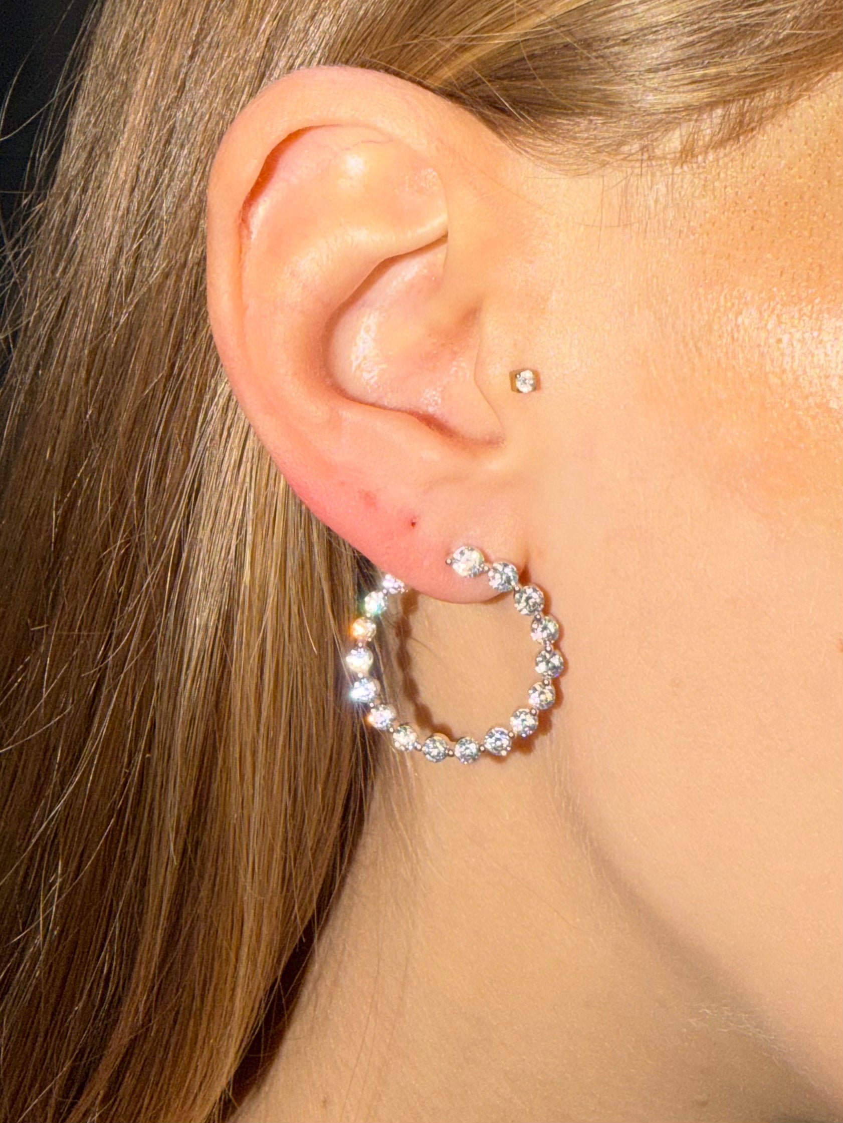 Outie Diamond Hoops front facing diamond hoops in white gold big size on ear  — Waltz Diamonds