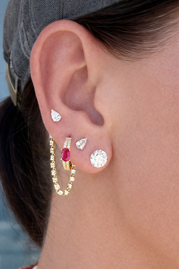 Pearfectionist stud pear cut stud earrings in yellow gold on model —Waltz Diamonds