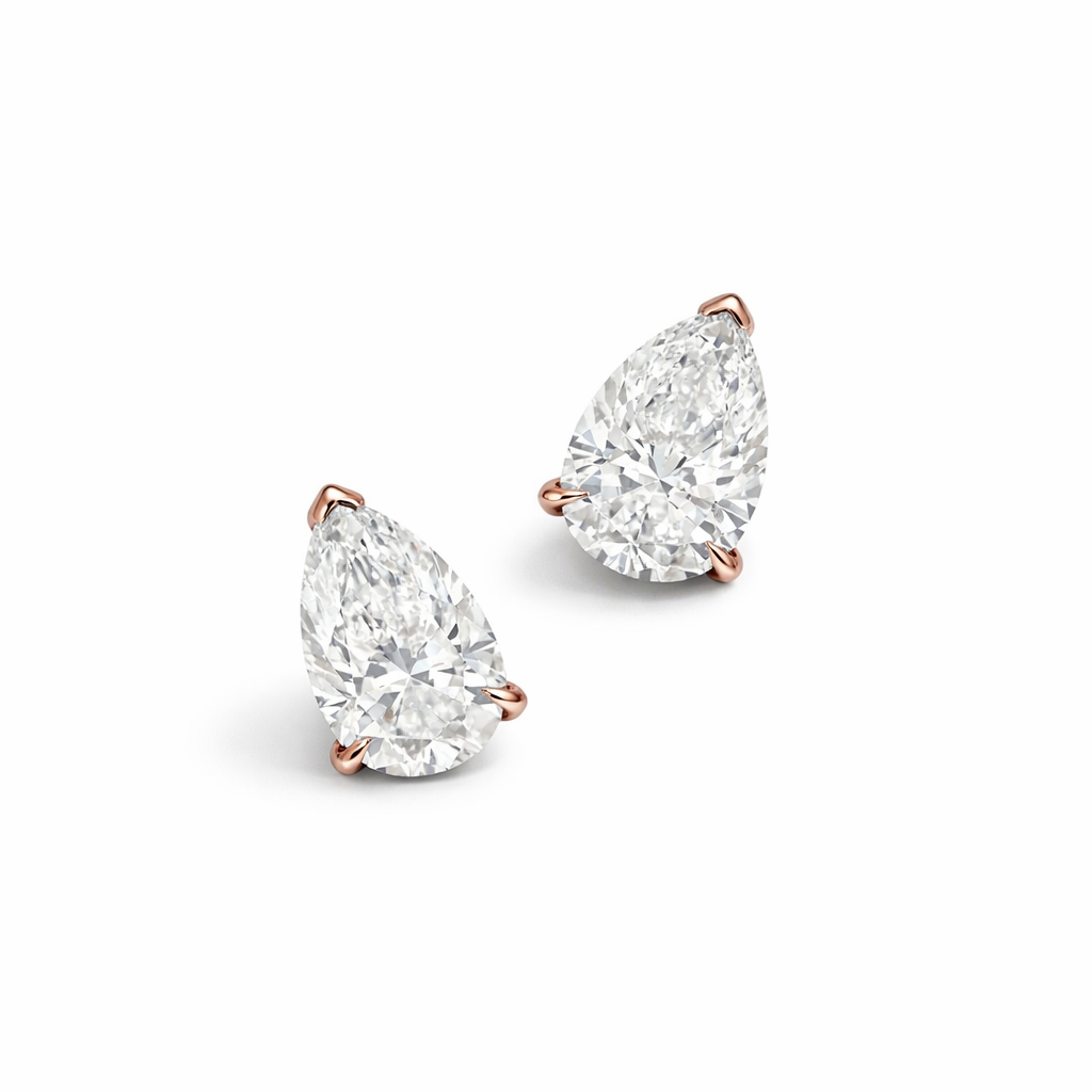 Pearfectionist studs pear cut diamond studs in rose gold prongs —Waltz Diamonds