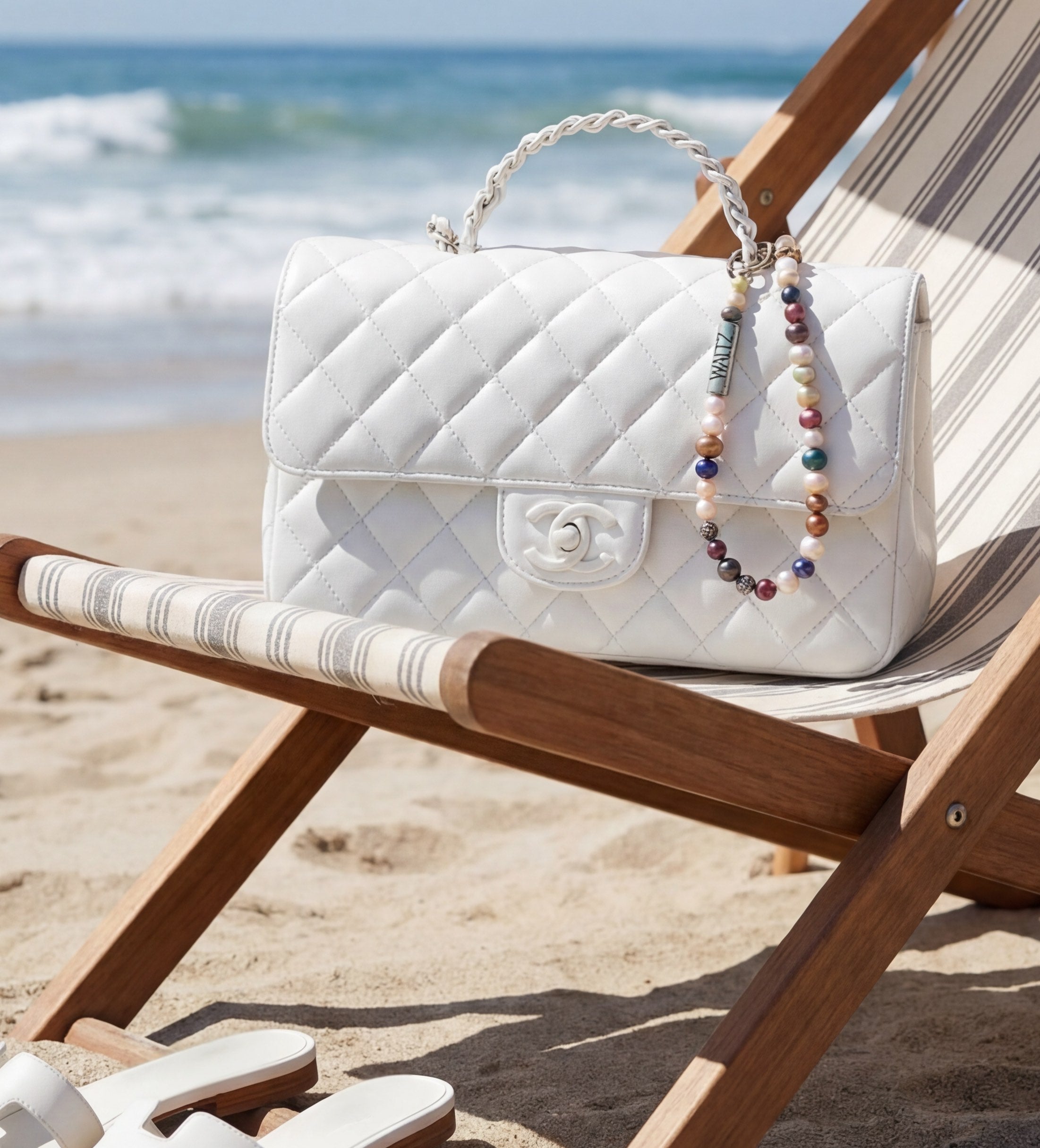Pearl Companion in multi-color styled on a white Chanel bag—Waltz Diamonds