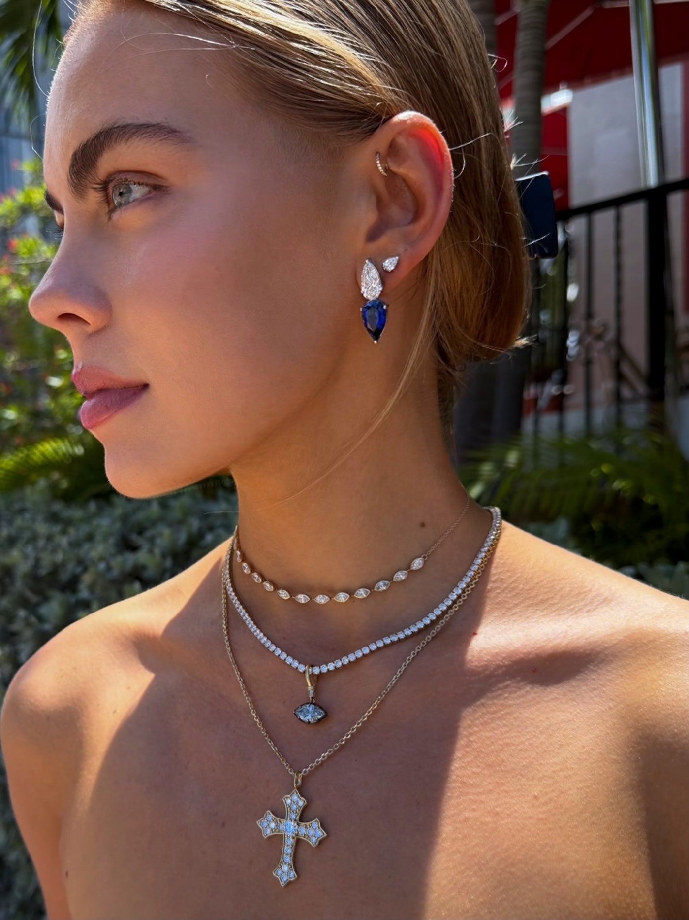 Raindrop Duo Stud elongated pear cut diamond and sapphire earring white gold worn and styled with several Waltz pieces— Waltz Diamonds