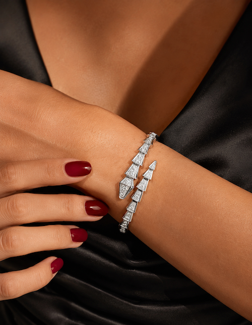 Slither Diamond Wrap bangle in 14k white gold with diamond-set snake design styled on the wrist— Waltz Diamonds