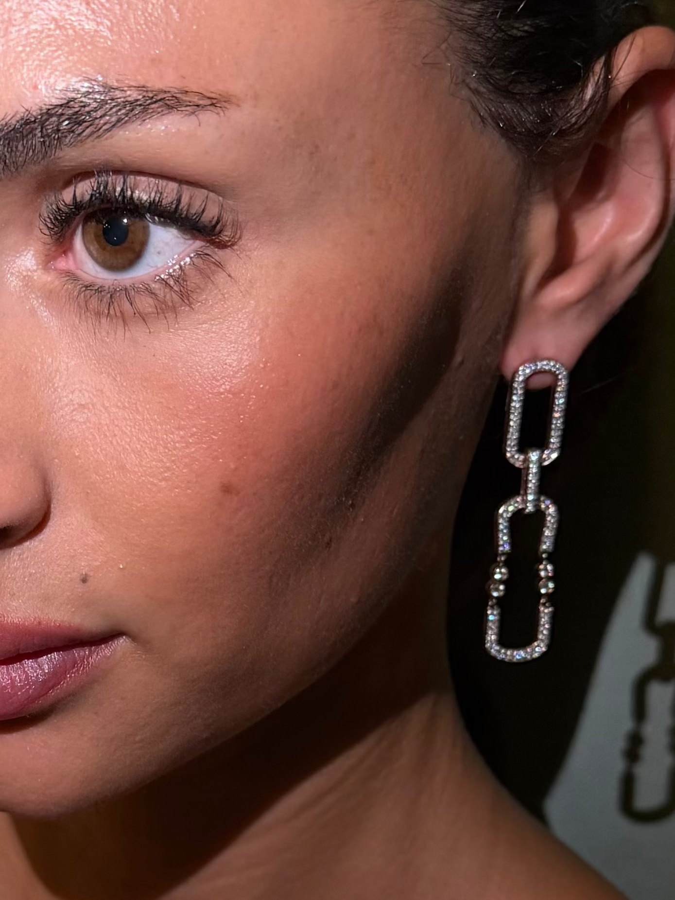 Swing Link Diamond statement earrings featuring two long pave links and bezel set diamonds in rose gold styled on ear — Waltz Diamonds