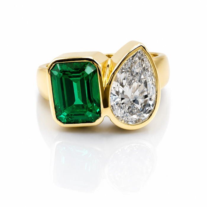 Take Two Toi et Moi Ring with a green emerald  and pear cut diamond in yellow gold  — Waltz Diamonds