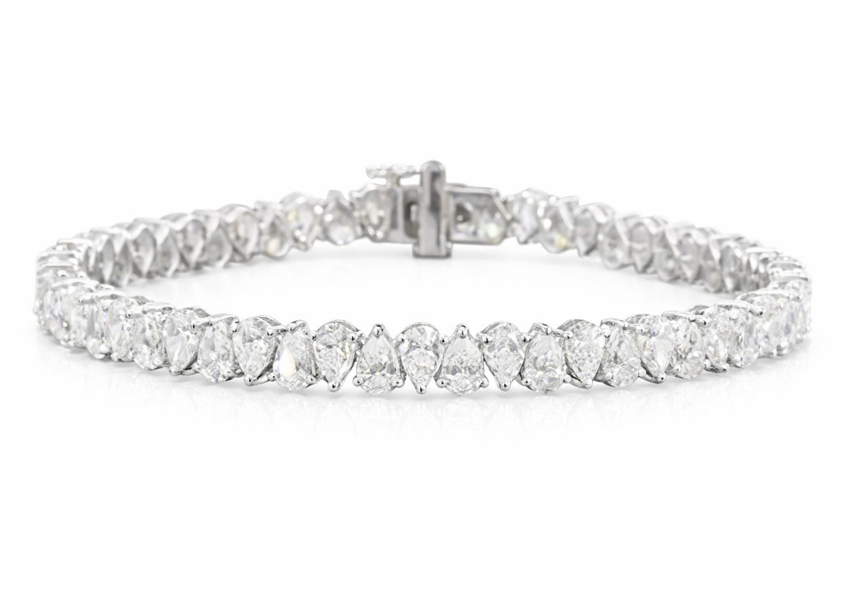 Tears of Joy rotating pear cut diamond tennis bracelet in white gold — Waltz Diamonds