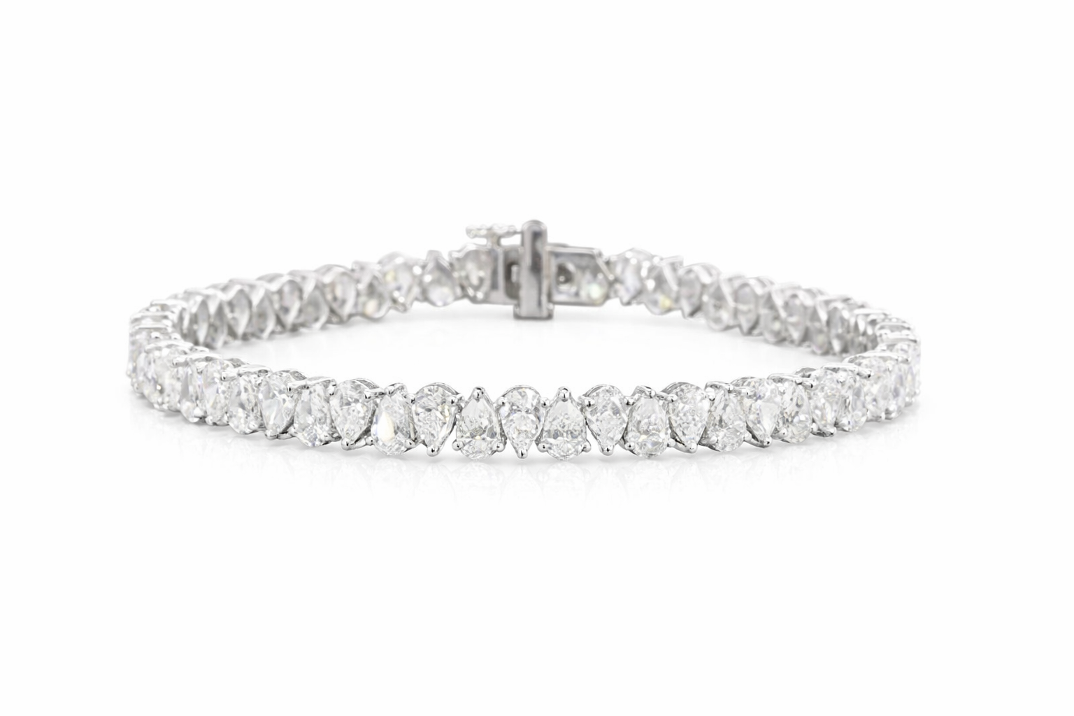 Tears of Joy rotating pear cut diamond tennis bracelet in white gold — Waltz Diamonds