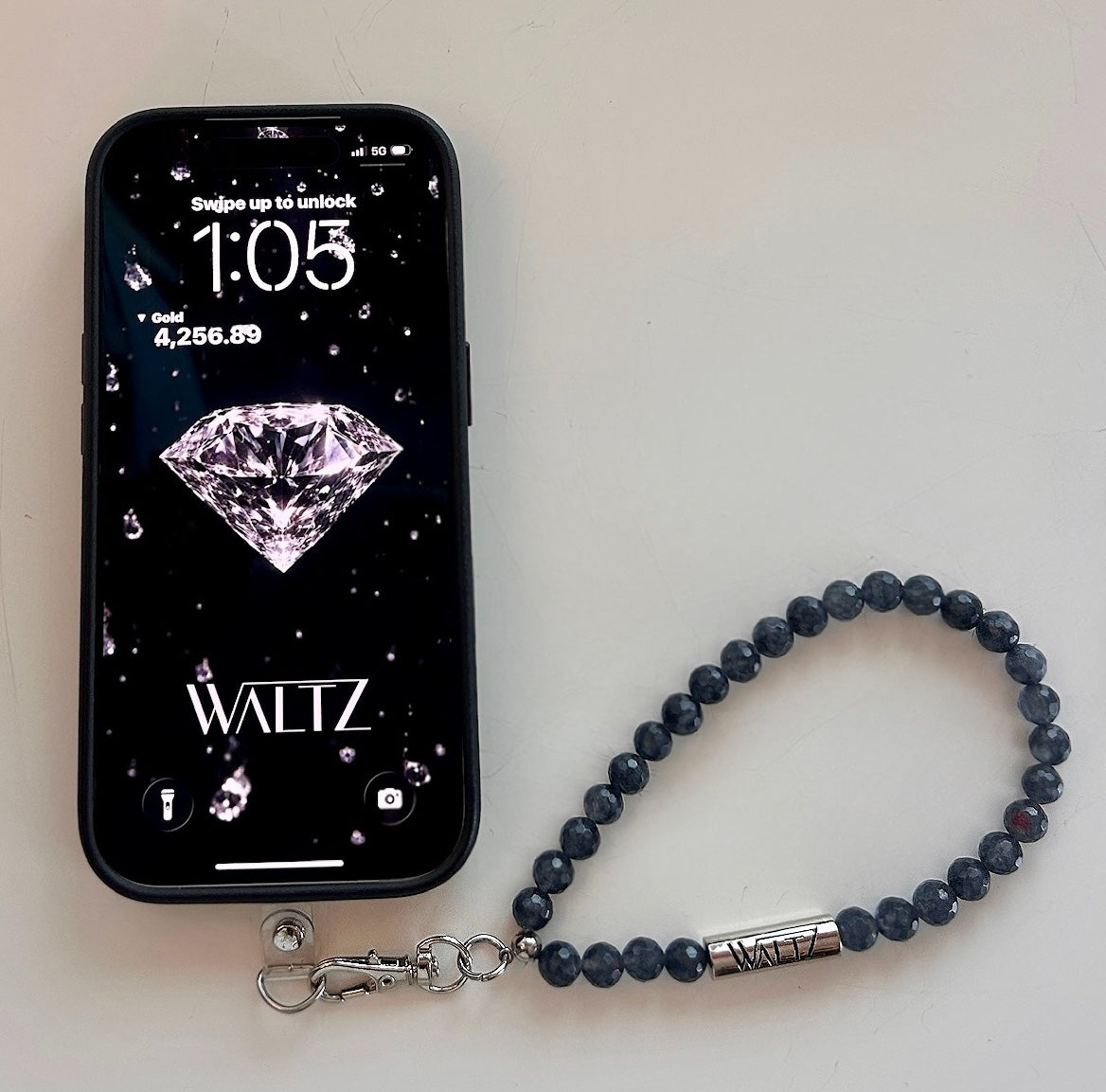 Agate phone wristlet shown on phone in smoke — Waltz Diamonds