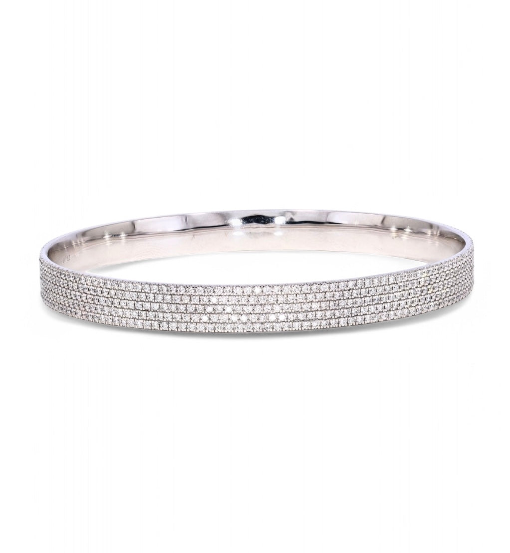 All Day Bangle in white gold, angled top view highlighting the smooth inner bangle and full pavé diamond surface.