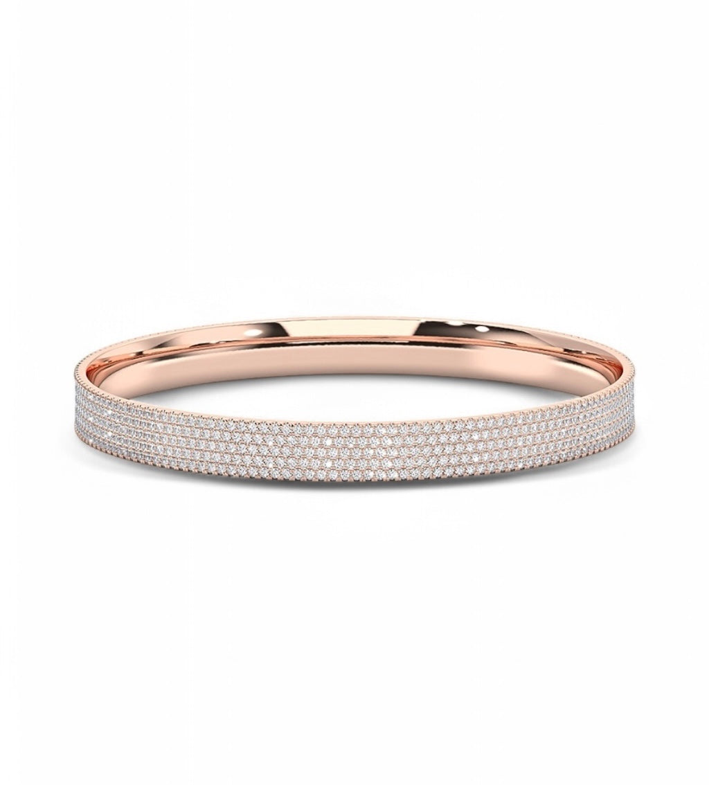 All Day Bangle in rose gold, pavé diamond bracelet shown from a diagonal top angle with inner side visible.