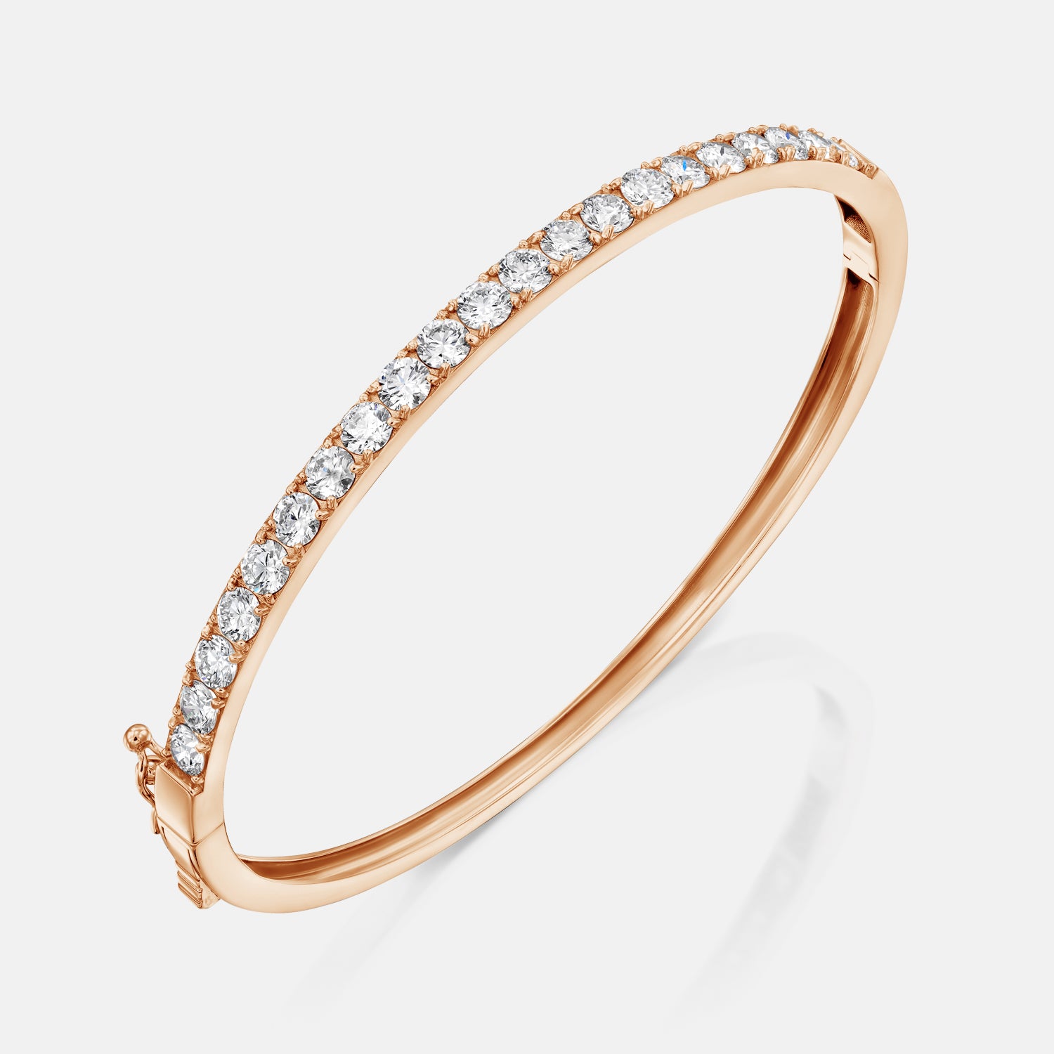 Rose gold version of the All Day Everyday Bangle, angled to show the polished inner side and streamlined silhouette.