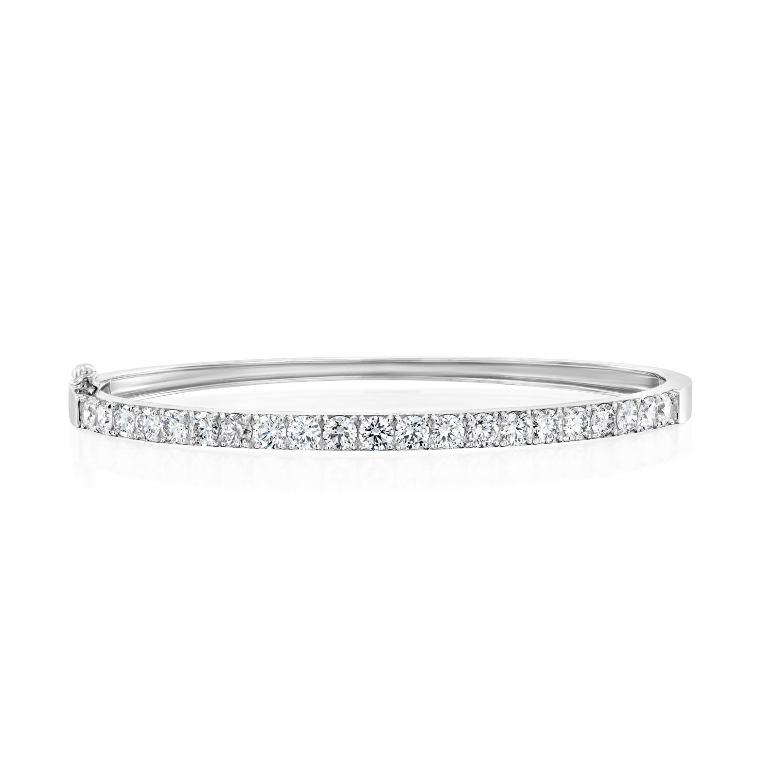 White gold All Day Everyday Bangle lying horizontally, with interior curve and diamond setting visible.